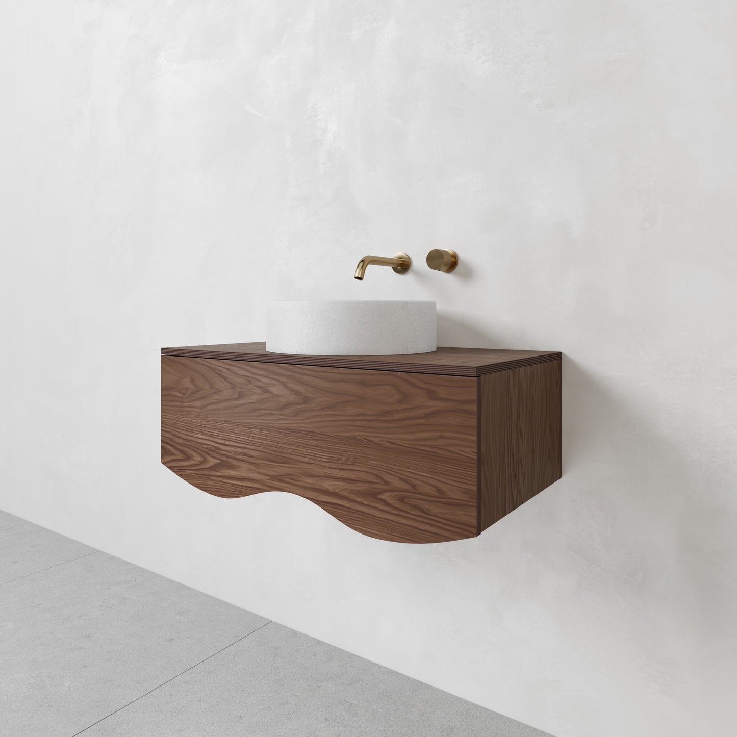 Walnut curved 900 wide vanity, that is wall hung. Brushed Brass features and white round basin