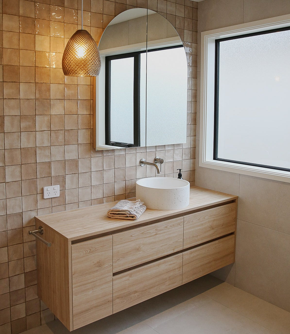 Modern bathroom with custom melamine vanity, white concrete sink, and recessed 900 wide cabinet Luna mirror